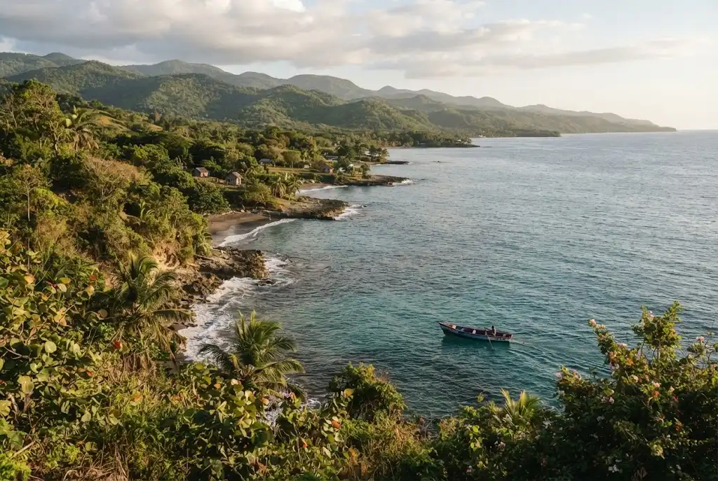 Tropical south coast landscape with turquoise water, green hills, and a fishing boat in St Elizabeth Jamaica